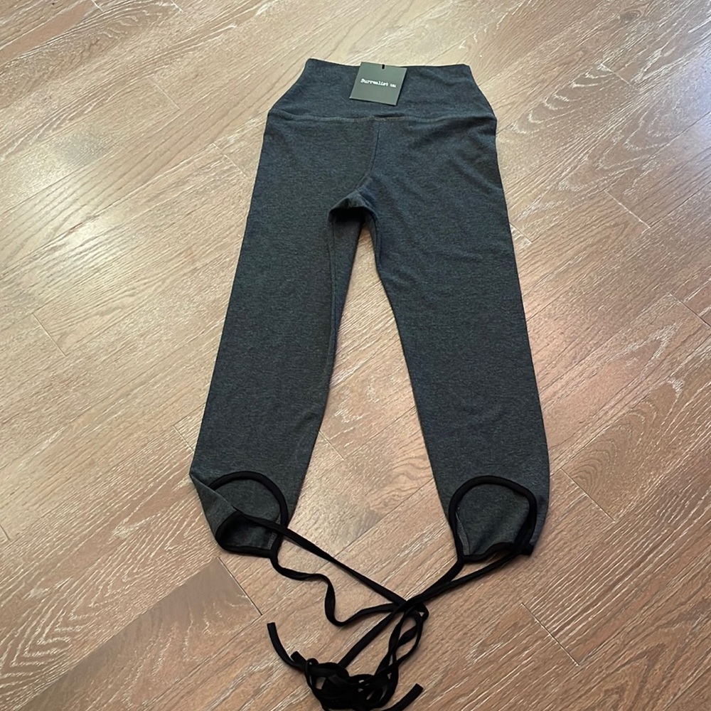 SURREALIST grey leggings with black laces at bottom. Brand new. Size 2.